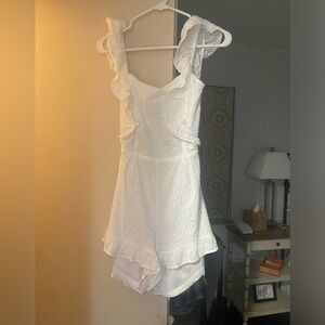 White romper with open back